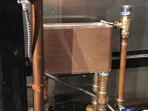 Piping the makes up part of the heat exchange system at Stoutridge Vineyard